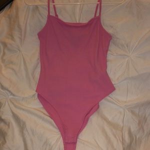 pink body suit